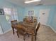 Conference room with table, chairs, and information display for residents at 8704 Knightsbridge Ct # B, Kissimmee, FL 34747