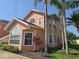 Charming two-story condo surrounded by lush landscaping and swaying palm trees at 8704 Knightsbridge Ct # B, Kissimmee, FL 34747