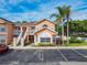 Beautiful condo with private staircase, parking, and lush landscaping at 8704 Knightsbridge Ct # B, Kissimmee, FL 34747