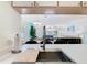 Open-concept view from the kitchen overlooking the living and dining area at 8704 Knightsbridge Ct # B, Kissimmee, FL 34747