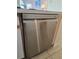 Sleek stainless steel dishwasher with digital controls, adding modern convenience to the kitchen at 8704 Knightsbridge Ct # B, Kissimmee, FL 34747