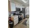 Well-equipped kitchen featuring stainless steel appliances, modern countertops, and plenty of storage at 8704 Knightsbridge Ct # B, Kissimmee, FL 34747