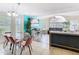 Spacious living area features large window and seamless transition to a dining area, perfect for entertaining at 8704 Knightsbridge Ct # B, Kissimmee, FL 34747