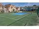Well-maintained community tennis court offers an active lifestyle option amidst beautifully landscaped surroundings at 8704 Knightsbridge Ct # B, Kissimmee, FL 34747