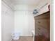 Spacious walk-in closet with ample shelving, storage, and a convenient laundry basket at 8704 Knightsbridge Ct # B, Kissimmee, FL 34747