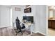 Bright office space featuring sleek desk and comfortable ergonomic chair at 987 Nathan Ridge Rd, Clermont, FL 34715