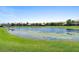 Stunning water views with lush surroundings enhance the beauty of this community at 10430 Belfry Cir, Orlando, FL 32832