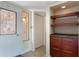 Entryway featuring a decorative glass door and built-in cabinetry at 105 Oaks Ct, Sanford, FL 32771