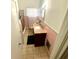 Bathroom with pink and brown accent tiles at 1181 Partlow Dr, Winter Garden, FL 34787