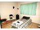 Simple bedroom with minimalist furnishings and natural light at 1181 Partlow Dr, Winter Garden, FL 34787