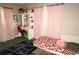 Bright bedroom with vanity, charming decor, and a comfortable bed at 1181 Partlow Dr, Winter Garden, FL 34787