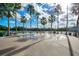 Community park with a water feature and palm trees with a scenic lake in the background at 1222 Golden Canna Ln, Celebration, FL 34747