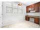 Dining area features a work station area with wooden cabinets and a large window at 1222 Golden Canna Ln, Celebration, FL 34747