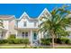 Charming two-story home with a well-maintained front yard and inviting curb appeal at 1222 Golden Canna Ln, Celebration, FL 34747