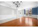 Hardwood and tile flooring in open-concept living area, offering versatility and style at 1222 Golden Canna Ln, Celebration, FL 34747