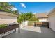 Outdoor patio with grey floor and white railing with a planter box at 1222 Golden Canna Ln, Celebration, FL 34747