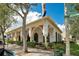 Charming exterior view of restaurant featuring architectural details and shaded patio seating at 1222 Golden Canna Ln, Celebration, FL 34747