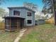 Enjoy the outdoors in this backyard featuring a screened gazebo and a well-manicured lawn at 1288 Se 32Nd St, Ocala, FL 34471