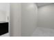 Hallway with tile floors next to the kitchen at 13619 Sw 78Th Place, Dunnellon, FL 34432