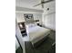 Cozy bedroom with a king bed, closet, carpeted floor and stylish decor at 14501 Grove Resort Ave # 3737, Winter Garden, FL 34787