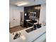 Modern kitchen features stainless steel appliances, sleek cabinets, and stylish countertops at 14501 Grove Resort Ave # 3737, Winter Garden, FL 34787
