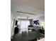 Living room and dining area with contemporary furnishings and ample natural light at 14501 Grove Resort Ave # 3737, Winter Garden, FL 34787