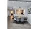 Open-concept living room with wood floors, ceiling fan, and lots of natural light at 14501 Grove Resort Ave # 3737, Winter Garden, FL 34787