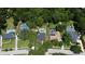 Aerial view of the property showcasing a large lot, private pool, mature trees, and neighborhood layout at 1462 Mt Laurel Dr, Winter Springs, FL 32708
