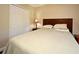 Cozy bedroom featuring a closet and soft, neutral decor at 1462 Mt Laurel Dr, Winter Springs, FL 32708