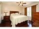 Inviting bedroom with hardwood floors, warm lighting, and a spacious layout at 1462 Mt Laurel Dr, Winter Springs, FL 32708