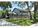 Charming two-story home with a well-manicured lawn and black shutters at 1462 Mt Laurel Dr, Winter Springs, FL 32708