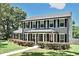 Two story home with black shutters and manicured lawn at 1462 Mt Laurel Dr, Winter Springs, FL 32708