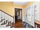 Inviting foyer with hardwood floors and staircase at 1462 Mt Laurel Dr, Winter Springs, FL 32708