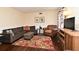 Inviting living room with plush seating, a decorative rug, and stylish decor at 1462 Mt Laurel Dr, Winter Springs, FL 32708