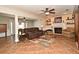 Inviting living room boasts tile floors, a fireplace, and an open layout for easy living and entertaining at 1462 Mt Laurel Dr, Winter Springs, FL 32708