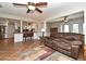 Open-concept living room offering seamless access to the kitchen and featuring comfortable seating and ample natural light at 1462 Mt Laurel Dr, Winter Springs, FL 32708