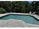 Landscaped pool area with sun loungers and patio at 1462 Mt Laurel Dr, Winter Springs, FL 32708