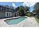 Inviting pool with brick patio, home exterior, and lush greenery at 1462 Mt Laurel Dr, Winter Springs, FL 32708