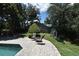 Backyard view of the outdoor patio and shed at 1462 Mt Laurel Dr, Winter Springs, FL 32708