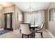 Inviting dining room featuring a decorative chandelier and plenty of natural light at 1600 N Wind Ct, Winter Springs, FL 32708