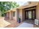 Charming front entrance with stone pathway and a stylish front door, offering curb appeal at 1600 N Wind Ct, Winter Springs, FL 32708
