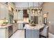 Beautiful kitchen with granite countertops, stainless steel appliances, and a breakfast bar at 1600 N Wind Ct, Winter Springs, FL 32708