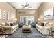 Bright living room with a ceiling fan, neutral tones, and stylish furnishings at 1600 N Wind Ct, Winter Springs, FL 32708