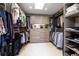 Spacious walk-in closet with custom shelving and ample storage space at 1600 N Wind Ct, Winter Springs, FL 32708