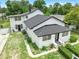 Overhead angle of the property highlighting the clean roofline, well-maintained landscaping, and inviting front yard at 161 Bolender Rd, Auburndale, FL 33823