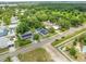 An aerial shot showcasing a neighborhood setting, with well-manicured lawns and proximity to local amenities at 161 Bolender Rd, Auburndale, FL 33823
