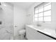 Bathroom showcasing a sleek vanity and a luxurious glass-enclosed shower at 161 Bolender Rd, Auburndale, FL 33823