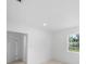 Bedroom showcasing hardwood floors and a peaceful view at 161 Bolender Rd, Auburndale, FL 33823