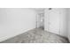 Inviting bedroom with soft carpet, two doors, and a large window at 161 Bolender Rd, Auburndale, FL 33823