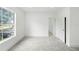 Bright bedroom filled with natural light and neutral tones, with a view to the outside at 161 Bolender Rd, Auburndale, FL 33823